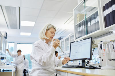 Woman working in laboratory