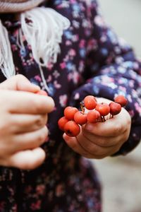 Close-up of hand holding fruit