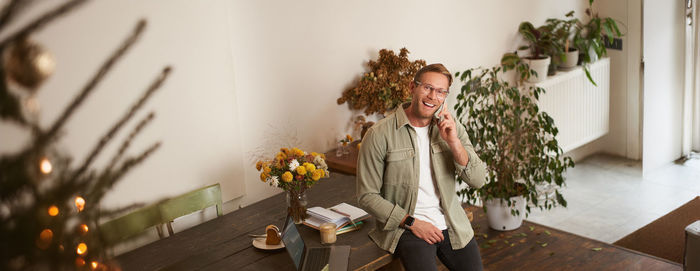 Rear view of woman standing on street
