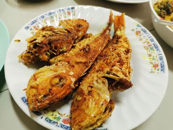 High angle view of meat in plate on table