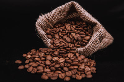 Close-up of coffee beans on table