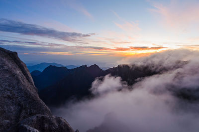 Scenic view of mountains against sky during sunset