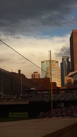 Cityscape against sky during sunset