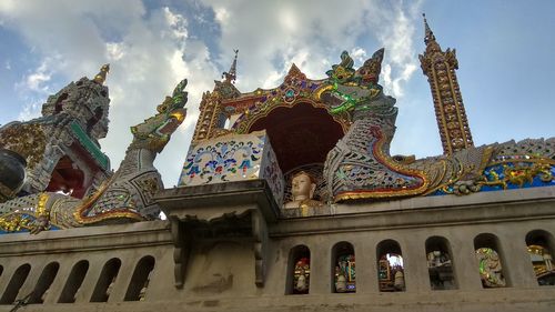 Low angle view of temple against building