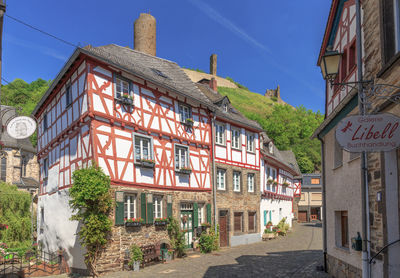 Houses against sky in city