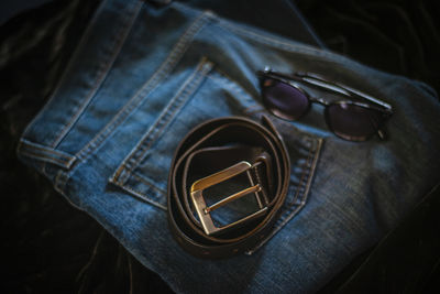 High angle view of sunglasses on mirror