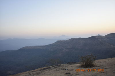 Scenic view of mountains against clear sky