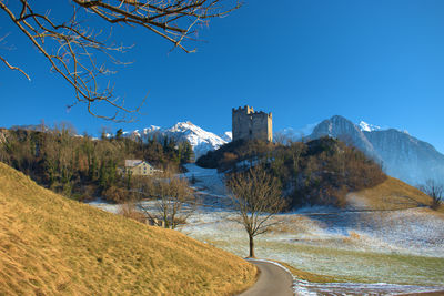 Historic old ruin in a beautiful mountain panorama in wartau in switzerland 10.1.2021