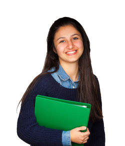 Portrait of a smiling young woman against white background