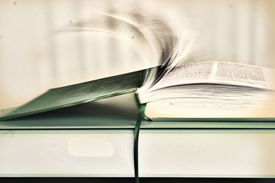 Close-up of open book on table