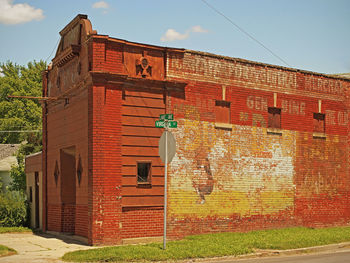 Brick wall with buildings in background