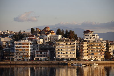 Buildings in city against sky