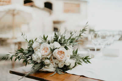 Close-up of white rose on table