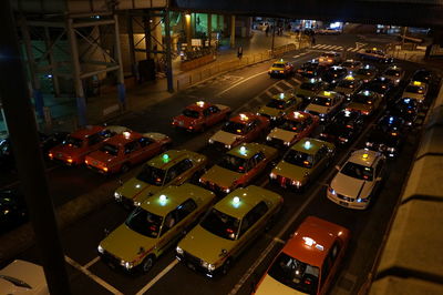High angle view of illuminated road at night
