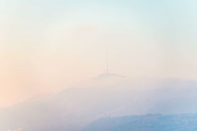 Scenic view of mountains against sky during sunset