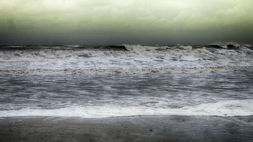 Scenic view of beach and sea against sky