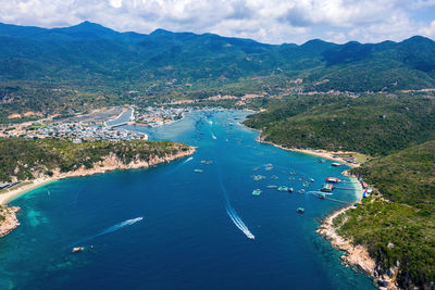 High angle view of sea and mountains