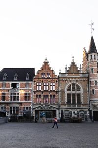 View of buildings against clear sky