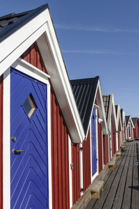 View of beach huts against buildings