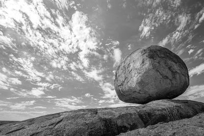 Low angle view of rocks against sky