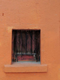 Closed window of old building