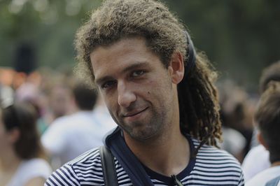 Portrait of man with dreadlocks outdoors