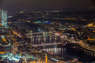 High angle view of illuminated city at night