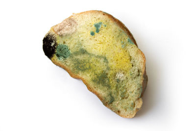 High angle view of bread against white background