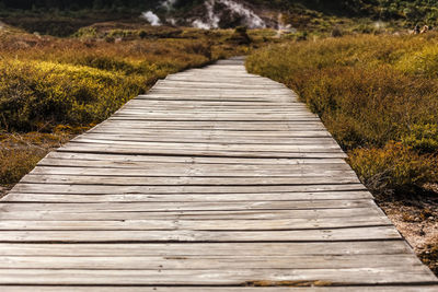 Surface level of boardwalk on footpath