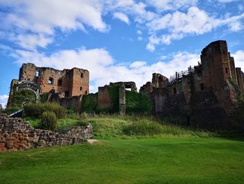 Old ruin building against cloudy sky
