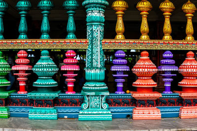 Row of multi colored temple outside building
