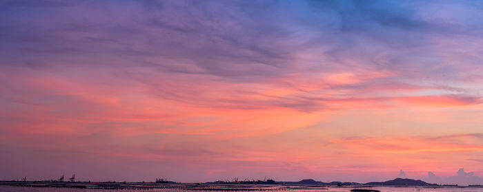 Scenic view of sea against sky at sunset