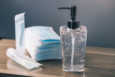 Close-up of glass bottle on table