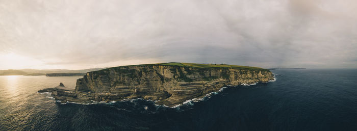 Rugged cliff coastline panorama agains the atlantic ocean in cantabria, spain.