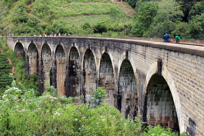 Arch bridge over river