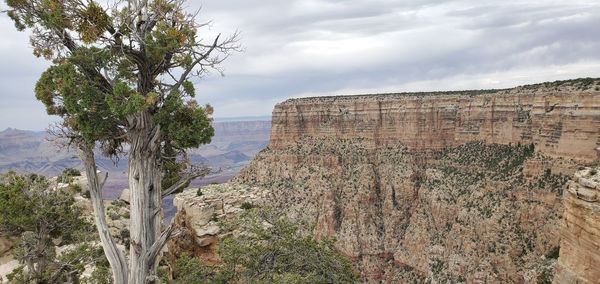 Scenic view of rock formations against sky