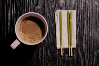 Directly above shot of coffee cup on table