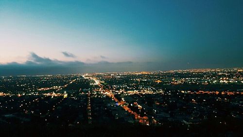 Aerial view of illuminated cityscape