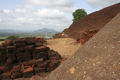 Old ruins at sigiriya against cloudy sky