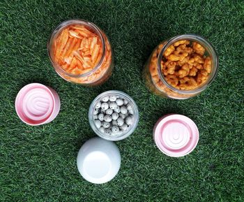 High angle view of candies on field