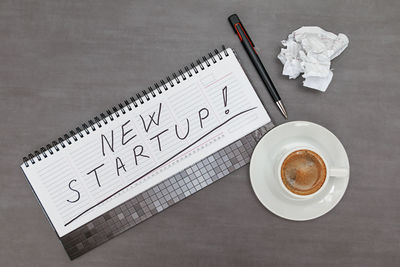 High angle view of coffee cup on table