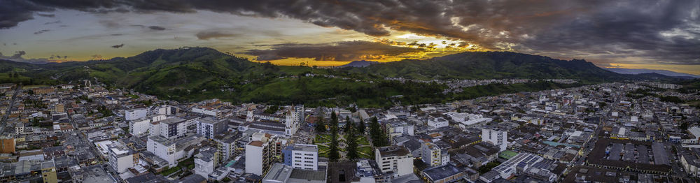 Aerial view of townscape against sky