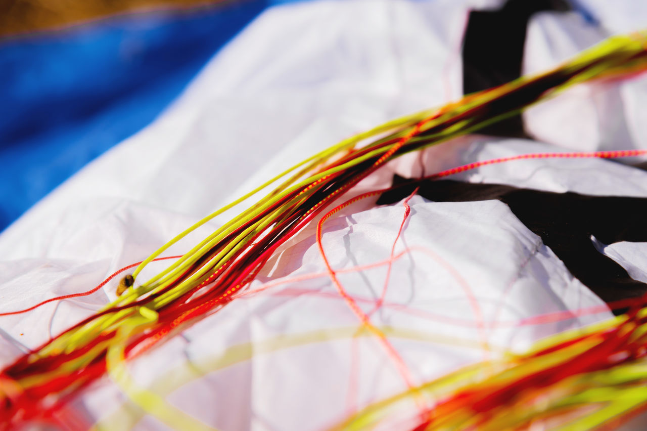 multi colored, yellow, close-up, art, selective focus, textile, no people, red