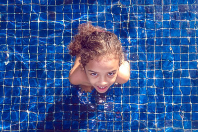 High angle view of girl in swimming poo