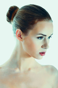 Close-up portrait of a serious young woman