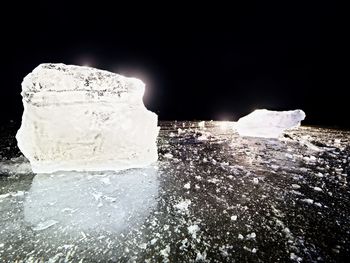 Close-up of ice crystals against black background