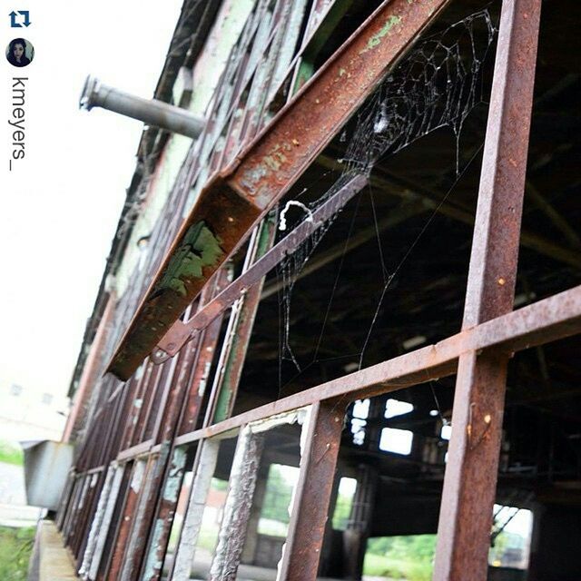 built structure, architecture, low angle view, metal, wood - material, building exterior, old, metallic, no people, day, abandoned, outdoors, railing, clear sky, close-up, bridge - man made structure, connection, building, part of, engineering