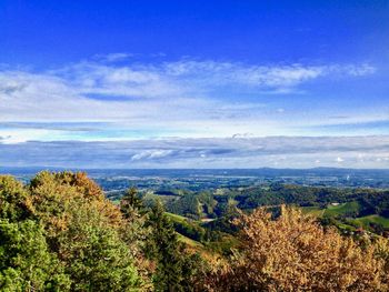 High angle view of landscape against blue sky