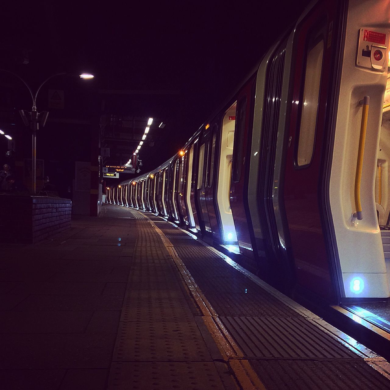 transportation, illuminated, public transportation, rail transportation, railroad track, railroad station platform, indoors, railroad station, train - vehicle, the way forward, mode of transport, night, diminishing perspective, train, empty, travel, passenger train, public transport, built structure, in a row