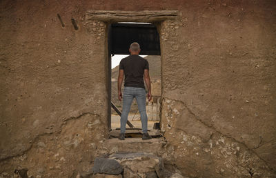 Adult man in film set in tabernas desert, almeria, spain